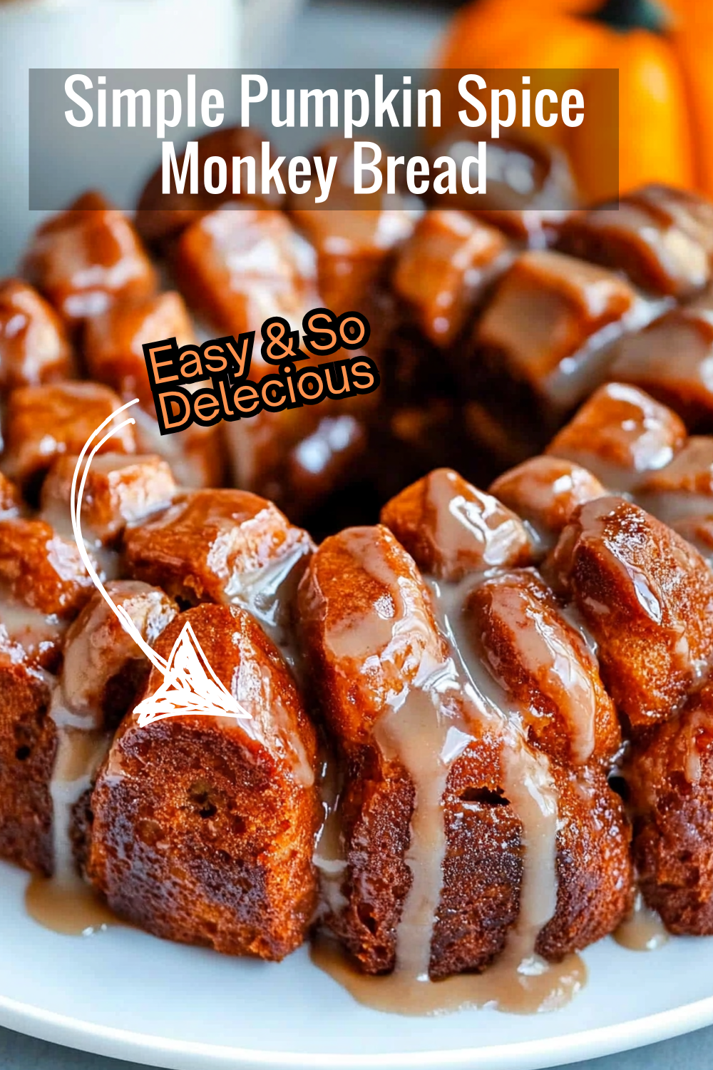 Satisfy your sweet tooth with this simple Pumpkin Spice Monkey Bread. Each dough piece is coated in a pumpkin spice glaze for an easy, cozy dessert.