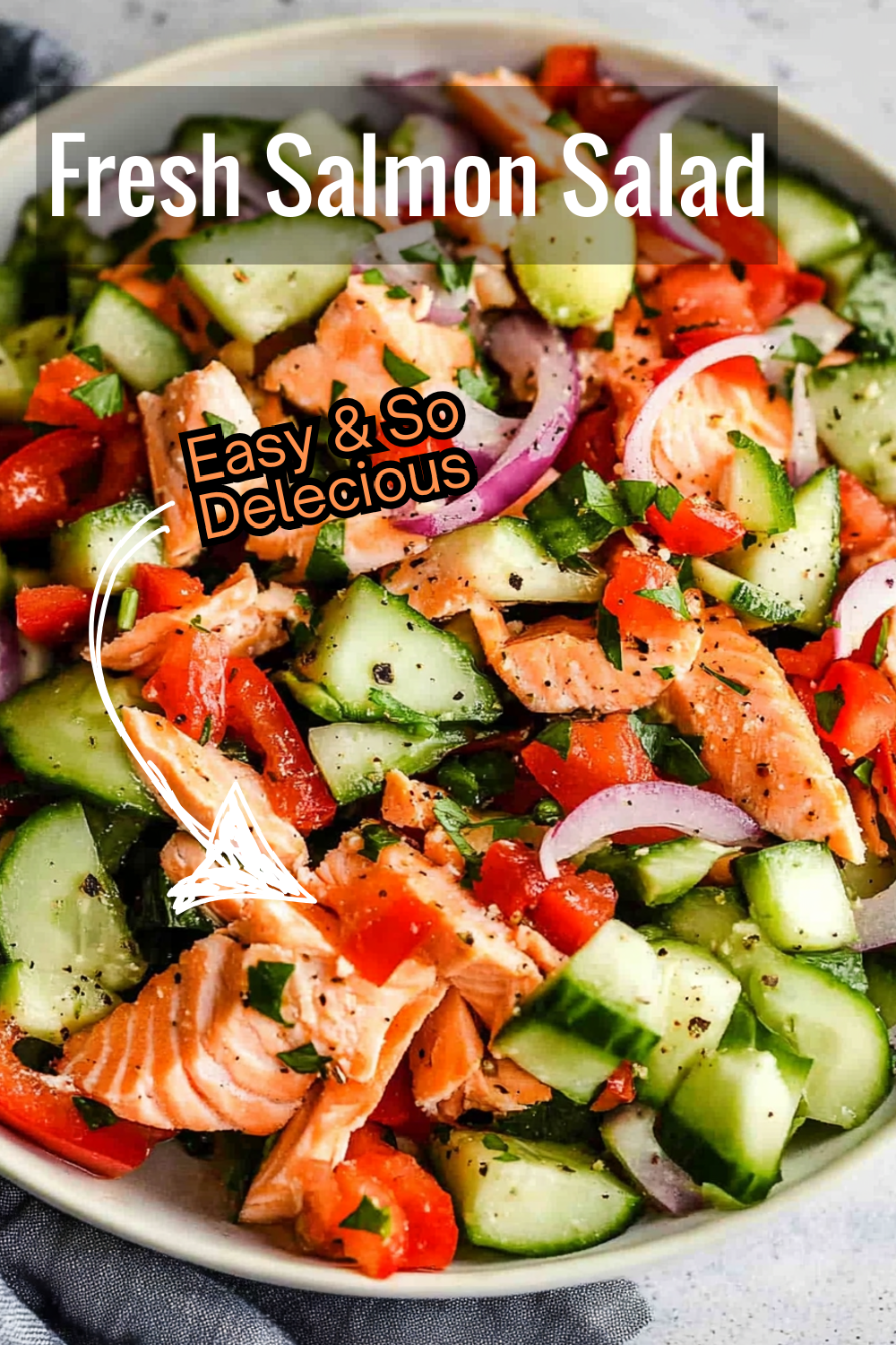 Enjoy a light and fresh salmon salad, with tender salmon chunks, cucumbers, and a sprinkle of parsley for added flavor. Ideal for a healthy meal!