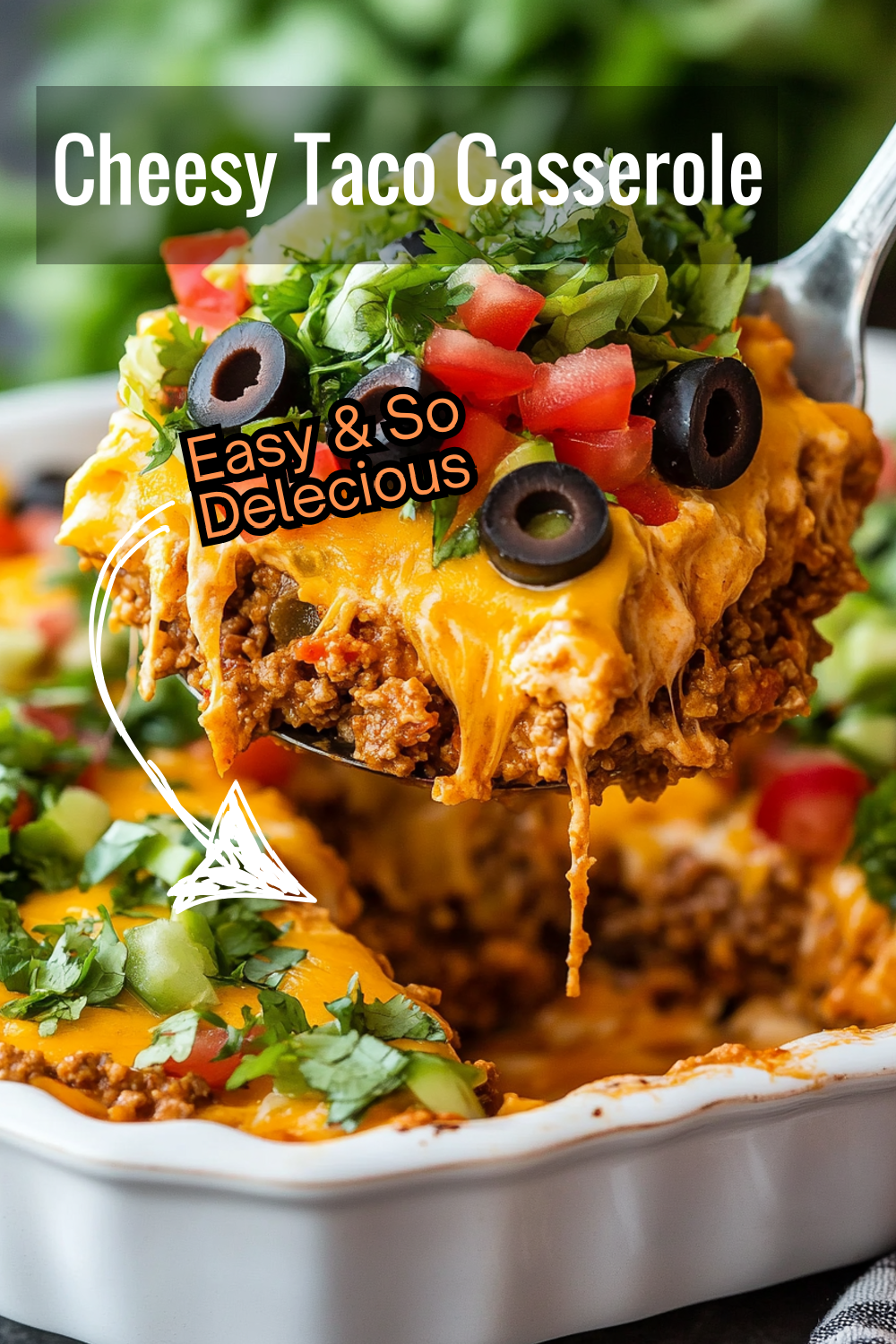 Dive into a cheesy taco casserole delight with layers of seasoned ground beef, refried beans, crunchy tortilla chips, and a thick layer of melted cheddar cheese. Perfect for any taco lover!