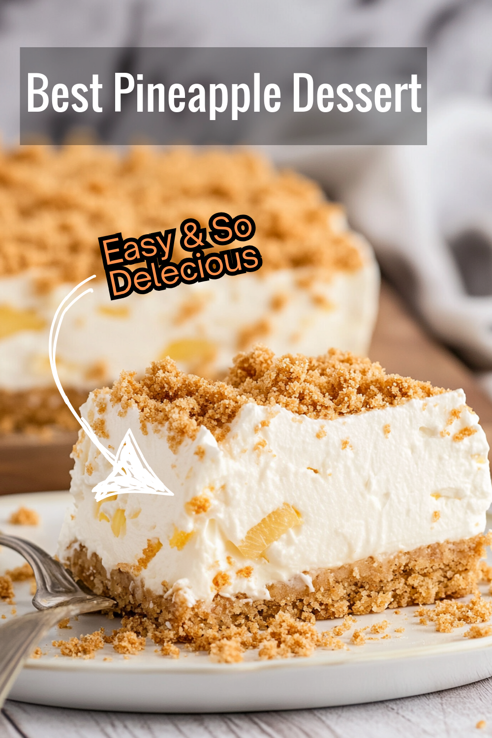 Indulge in the delightful flavors of a Pineapple Dream Dessert! A creamy pineapple layer over a buttery graham crust topped with a light Cool Whip layer.