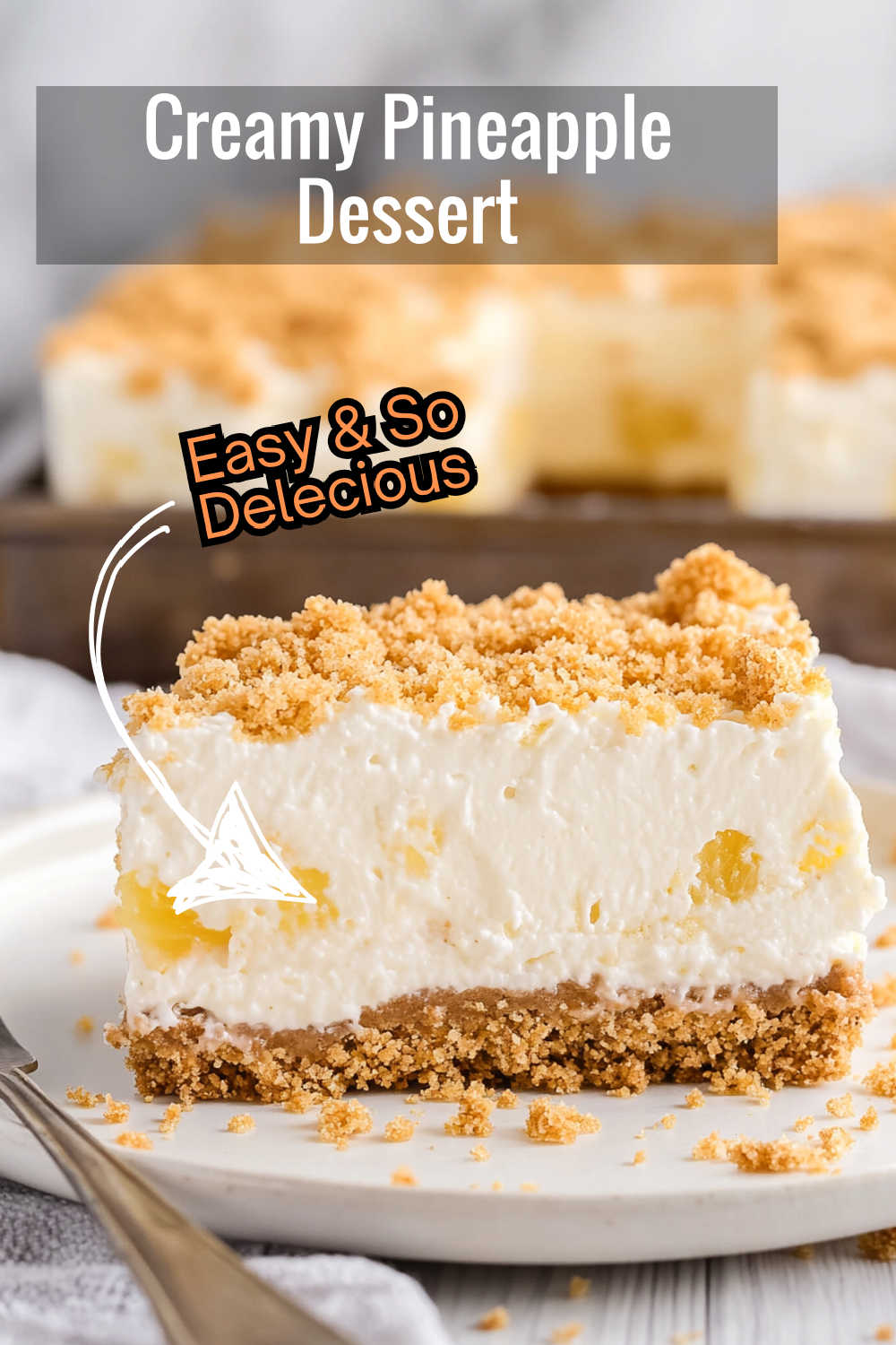 A creamy Pineapple Dream Dessert with layers of crushed pineapple, smooth cream cheese, and a graham cracker crust. Perfect for any pineapple lover!