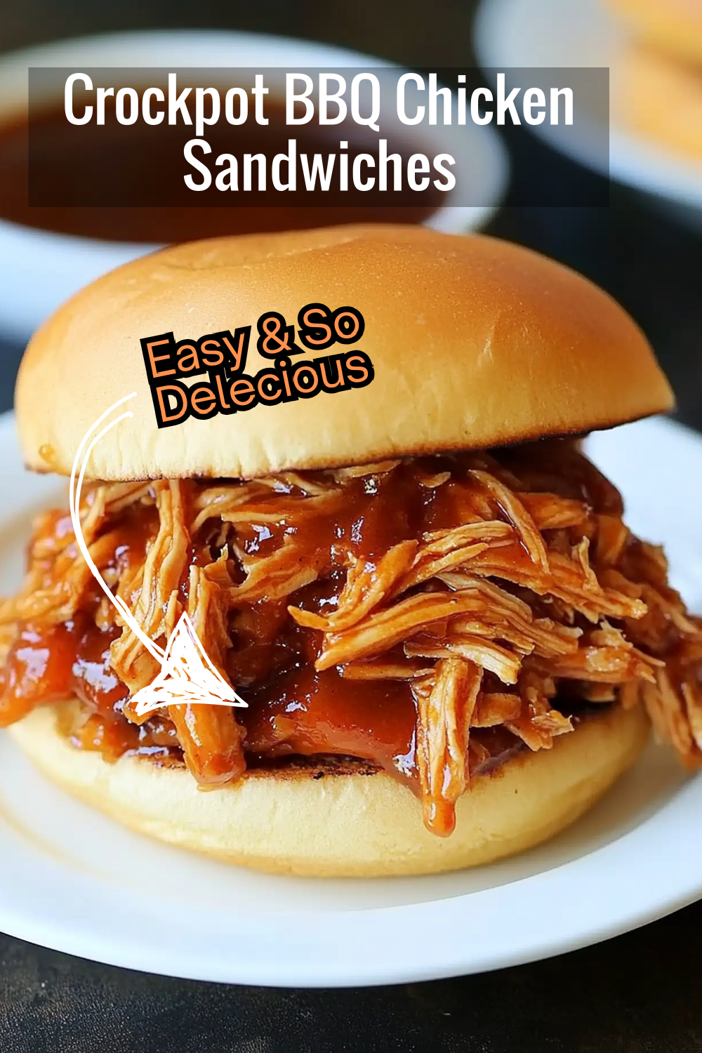 Need an easy sandwich filling? Try this Crockpot BBQ Pulled Chicken recipe! Juicy chicken breast, slow-cooked in a flavorful BBQ sauce, makes the perfect topping for soft sandwich rolls. Serve at your next gathering!