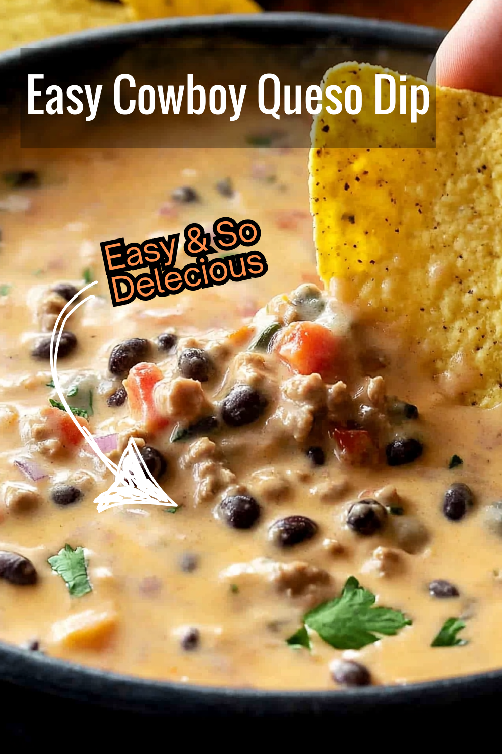 Scoop into cheesy perfection! This Cowboy Queso Dip blends smooth Velveeta, Pepper Jack, seasoned beef, and fresh Rotel tomatoes for an irresistible party hit.