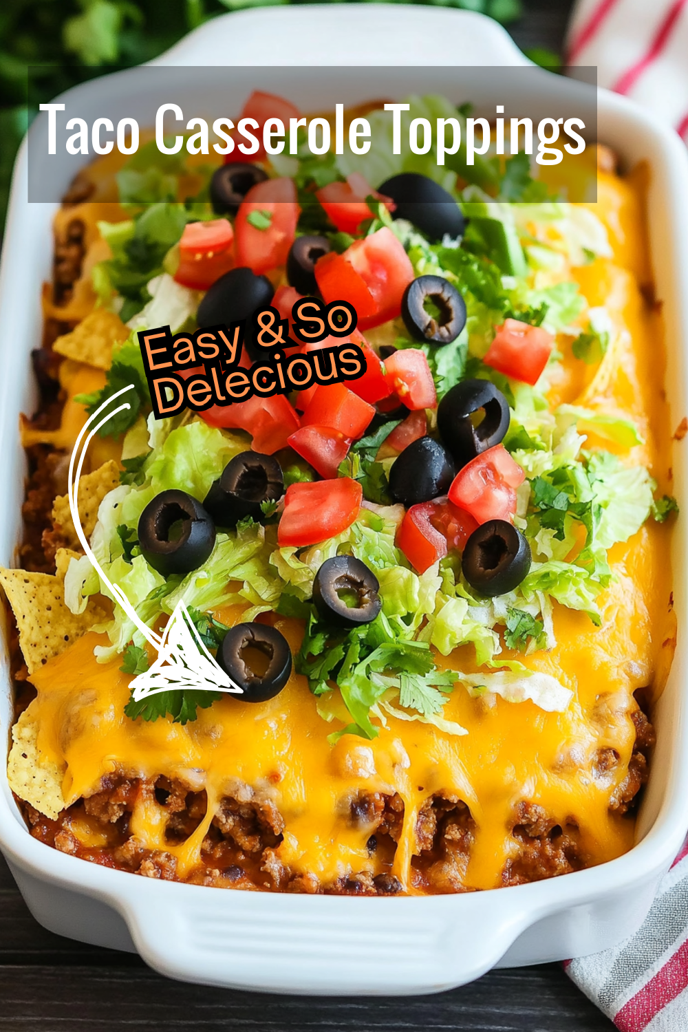 Add fresh toppings to this taco casserole for a colorful and tasty twist. Perfectly seasoned ground beef, beans, and cheese are complemented by crisp lettuce, tomatoes, and olives!