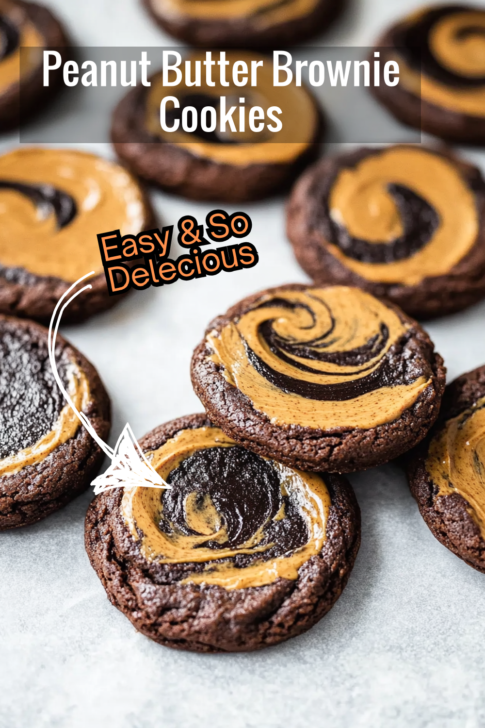 These peanut butter brownie swirl cookies combine the richness of fudgy brownies with the creaminess of natural peanut butter for a delicious, chewy treat.