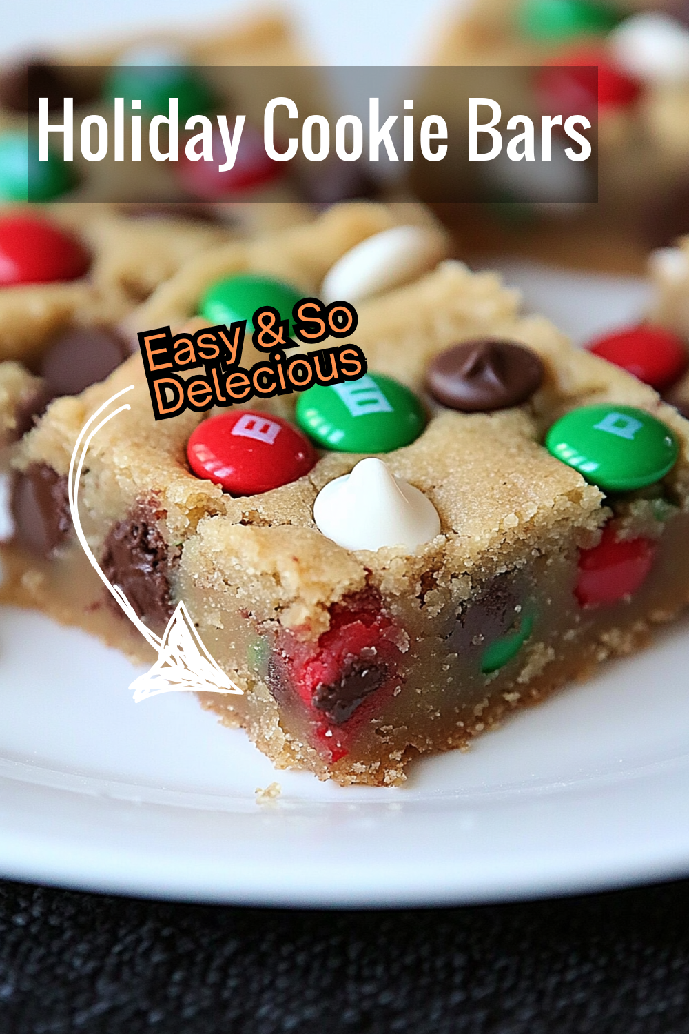 Get into the holiday spirit with this easy Christmas cookie bars recipe! These bars are filled with festive M&M’s and white chocolate chips, making them the ultimate holiday dessert for any occasion.