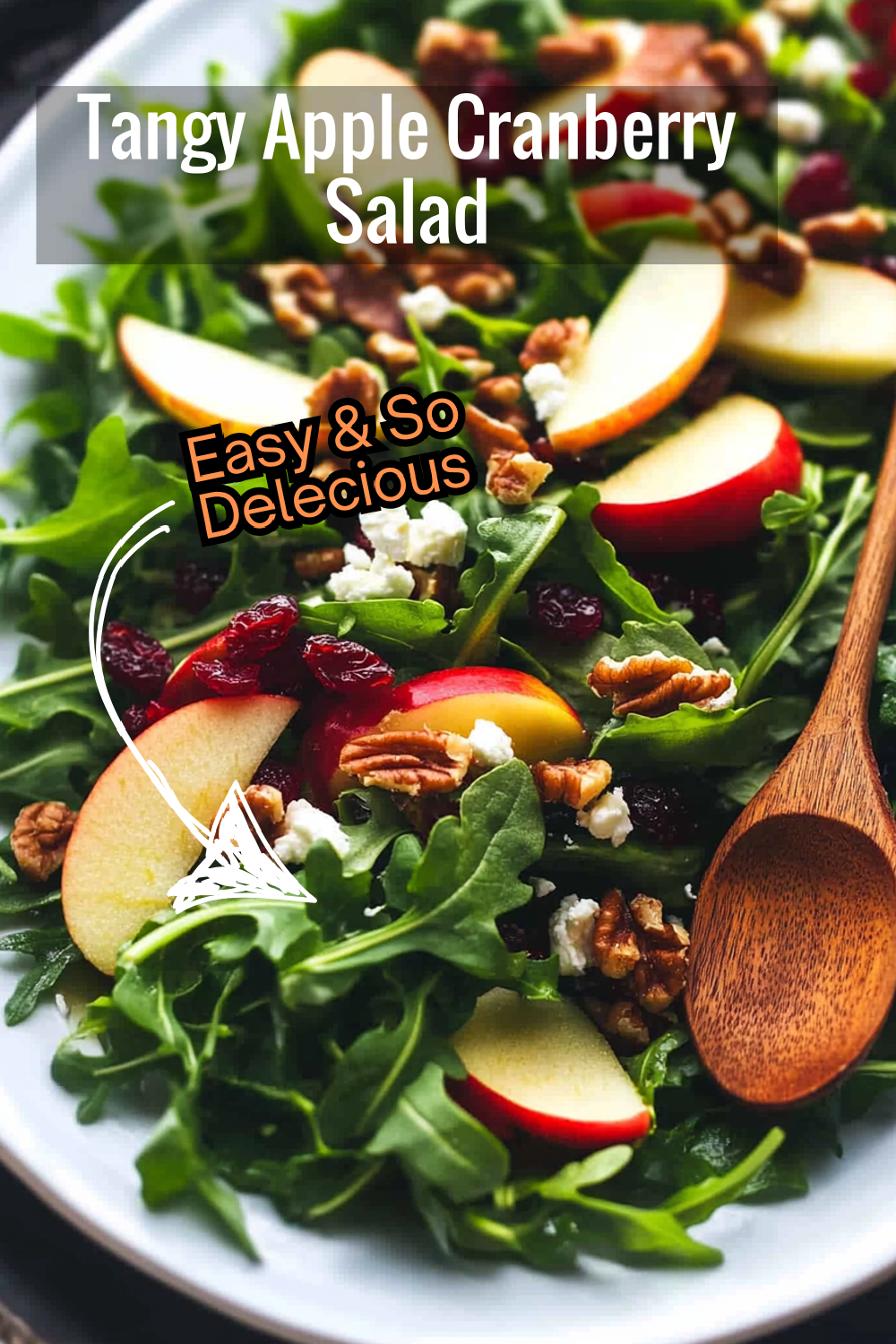 Toss together fresh apples, walnuts, and cranberries with a sweet apple cider dressing for a salad bursting with flavor!