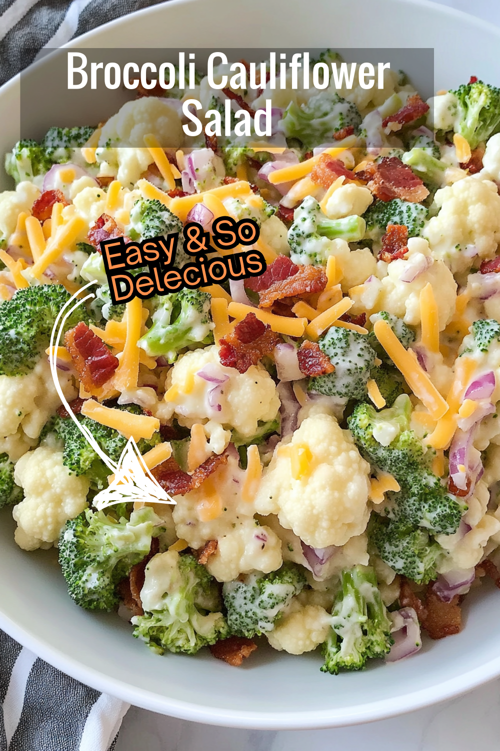 Enjoy a refreshing bite with this broccoli cauliflower salad, filled with crisp veggies, smoky bacon, and creamy dressing.