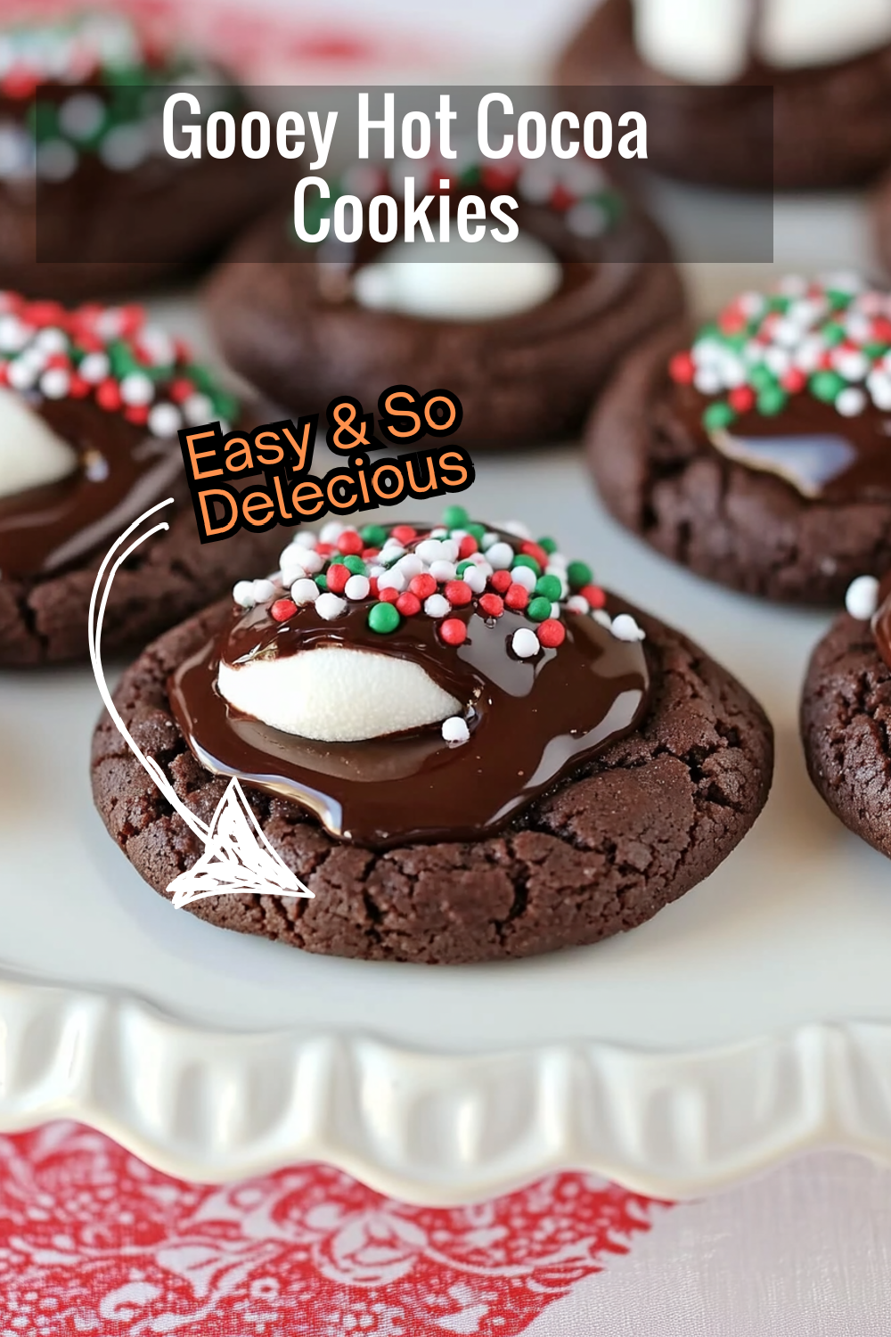 Love gooey cookies? These hot cocoa cookies are soft, loaded with chocolate, and topped with melty marshmallows and sprinkles – a holiday must-have!