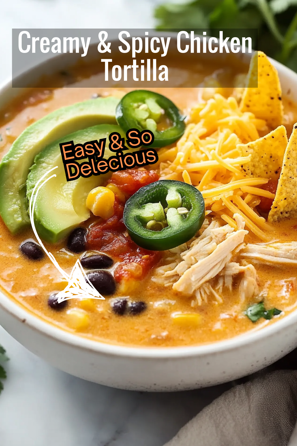 Smooth and spicy! This Chicken Tortilla Soup combines cheddar cheese, cream, and jalapeños for a perfect flavor punch.