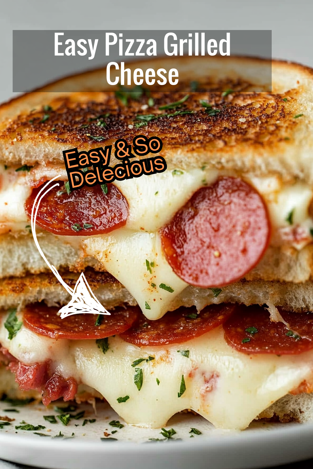 Try this simple Pizza Grilled Cheese Recipe! Crispy bread, gooey mozzarella, and pepperoni make the perfect cheesy bite in just minutes.